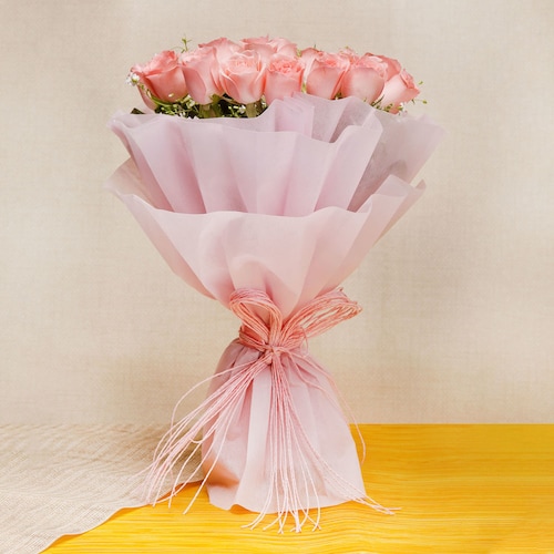 Buy 20 Pink Roses In Paper Packing