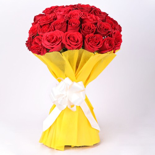Buy 35 Red Roses With Yellow Paper Packing