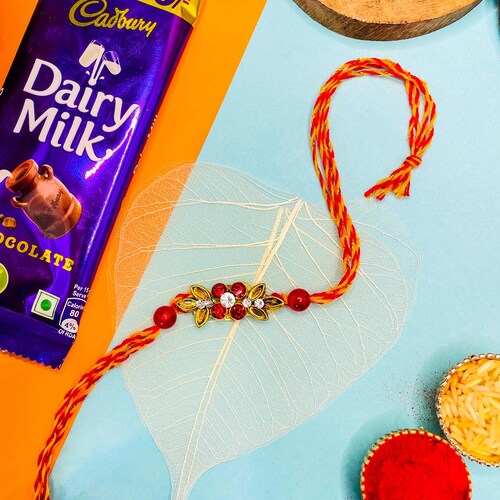 Buy Red Stone Rakhi With Dairy Milk Chocolate Bar