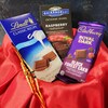 Buy Three Designer Rakhi Chocolate Hamper