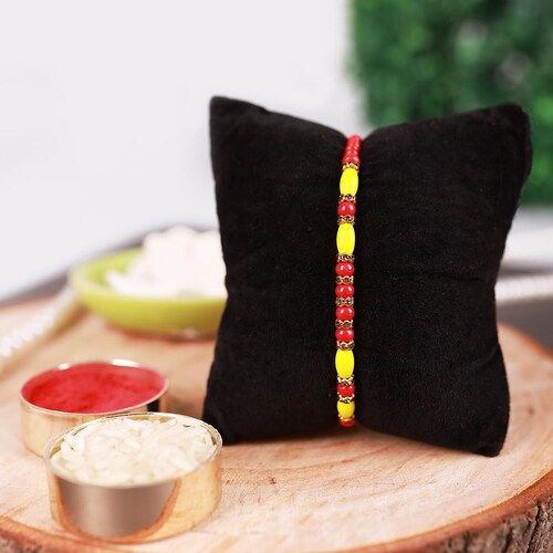 Buy Simple Red and Yellow Beads  Rakhi