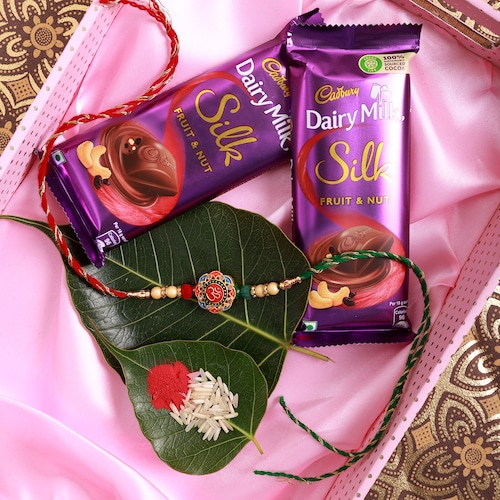 Buy Om Rakhi With Chocolate Combo