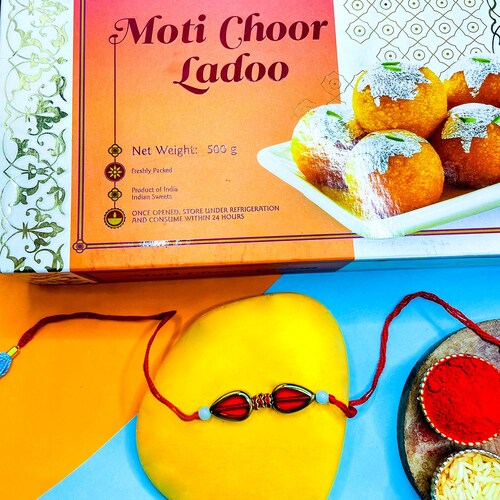 Buy Designer Rakhi With Laddu