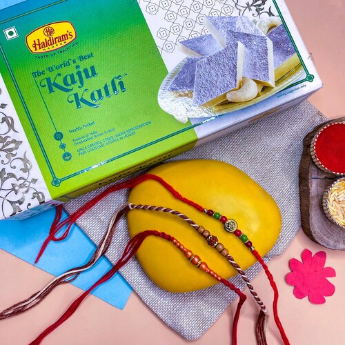 Buy Three Designer Rakhis Haldiram Kaju Katli