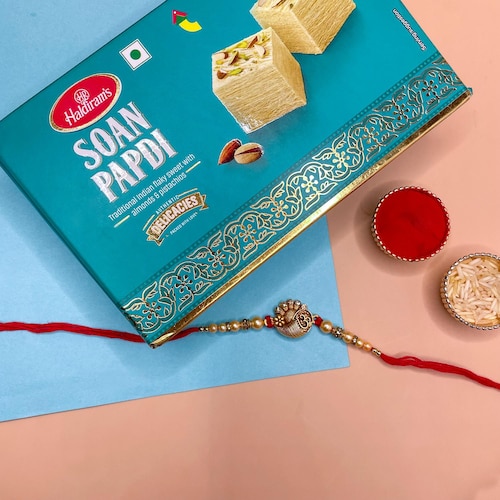 Buy Om Rakhi With Soan Papdi
