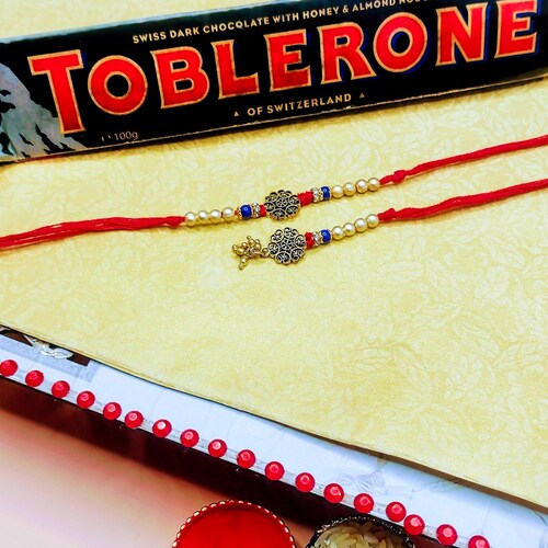 Buy Bhaiya Bhabhi Rakhi Set With Toblerone Chocolate
