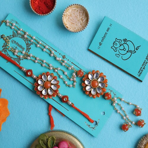 Buy Bhaiya Bhabhi Orange Floral Rakhi Set