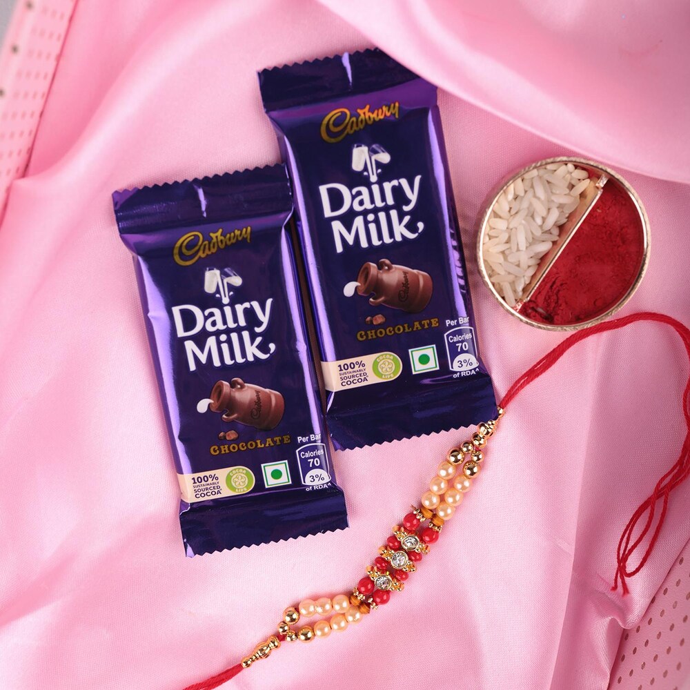 Two Layer Pearl Rakhi With Cadbury Dairy Milk Chocolate Winni