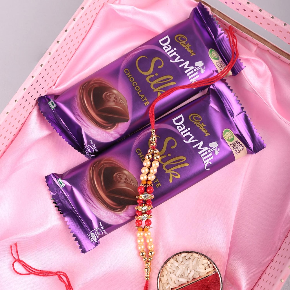 2 Layer Pearl Rakhi With Cadbury Silk Chocolate 60 gm | Winni.in