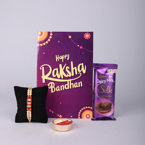 Buy Pearl Rakhi With Cadbury Silk Greeting Card Combo