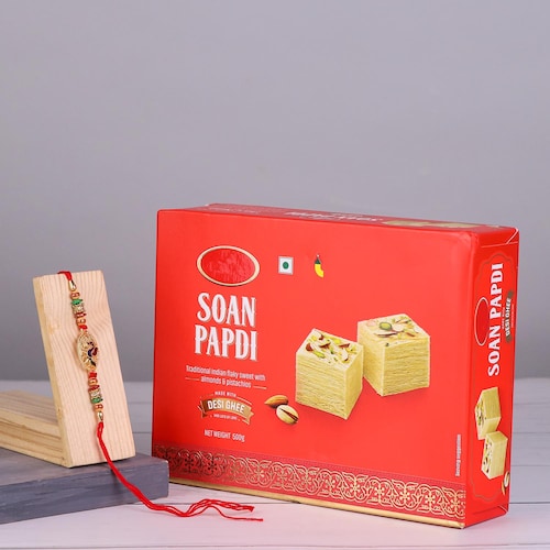 Buy Peacock  Rakhi With Soan Papdi