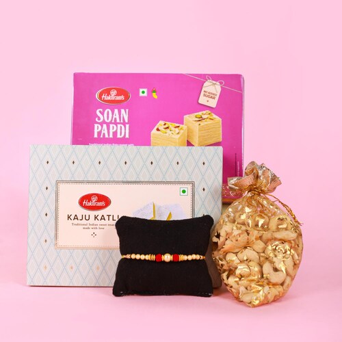 Buy Designer Rakhi With Assorted sweets And Dry fruit