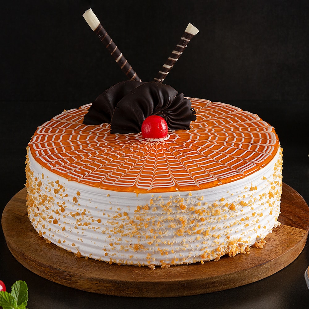 Order Online New Year Butter Scotch Cakes in vizag