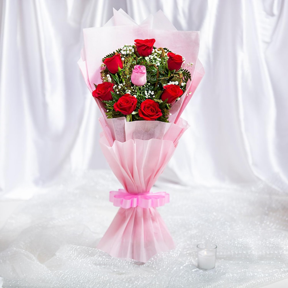 The FloralMart® Valentine's Special Fresh Flower Bouquet of 40 Red Roses in  Paper Wrapping