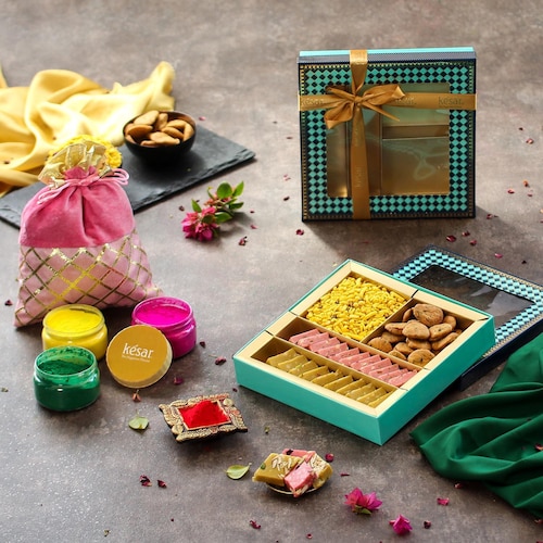 Buy Blend Of Herbal Colors With Sweets Hamper