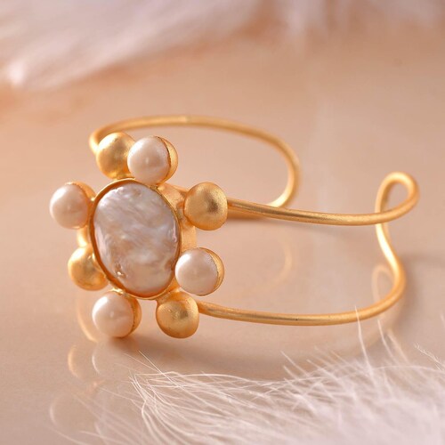 Buy Arihant Gems & Jewels Fashion Mother of Pearl Round Bracelet at