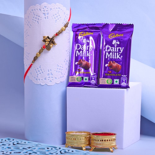 Buy Ganesha Rakhi With Dairy Milk Chocolate