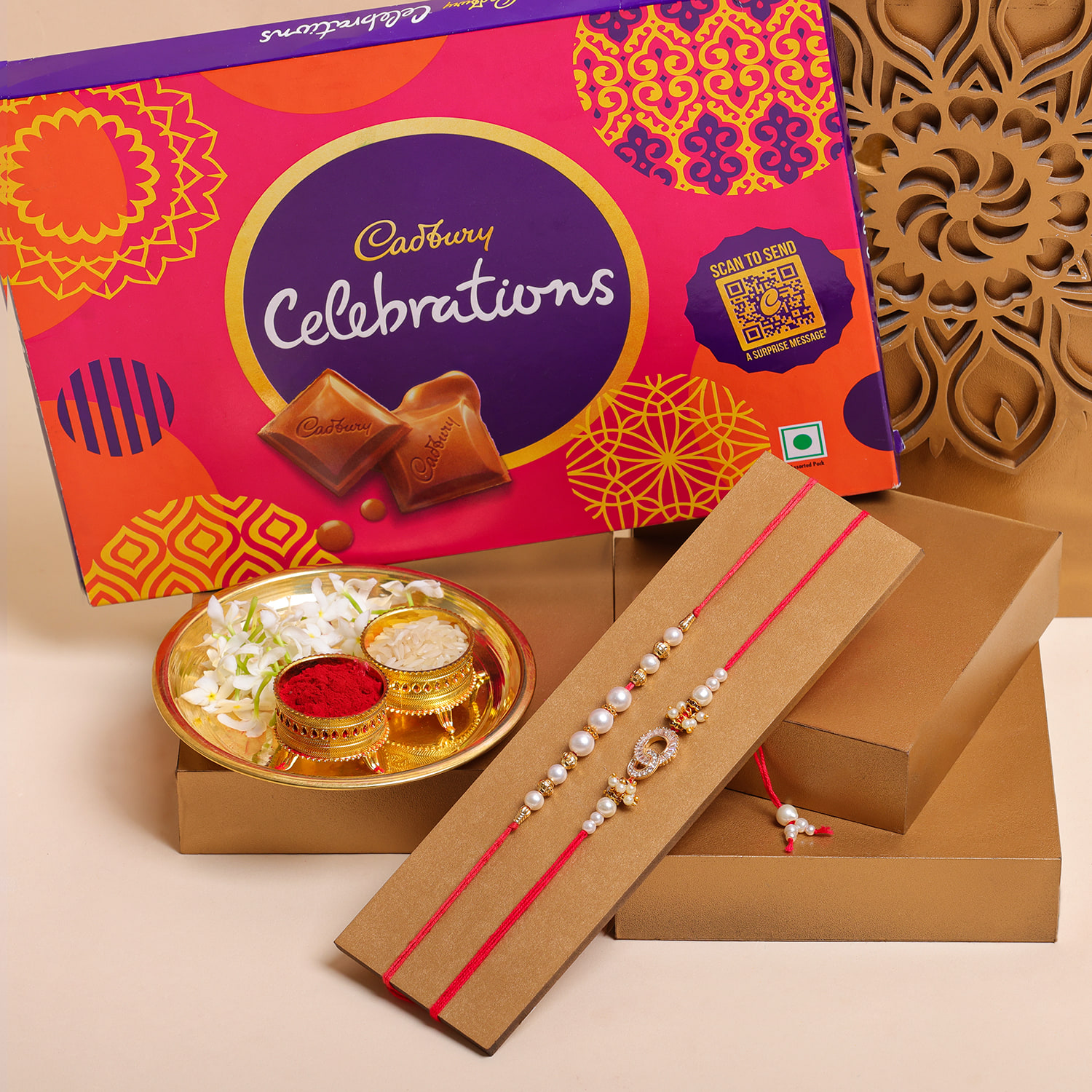 Buy or send Cadbury Celebration Chocolate with Rakhi Puja Thali and Amazing  Rakhis Online