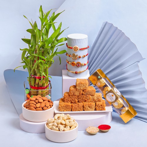 Buy Set Of 4 Rakhi With Bamboo Plant and Sweet