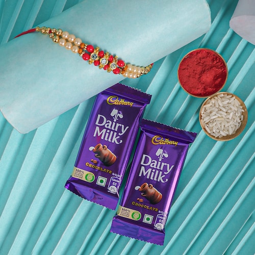 Buy Two Layer Pearl Rakhi With Cadbury Dairy Milk Chocolate