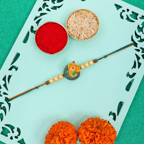 Buy Golden Ganpati Rakhi