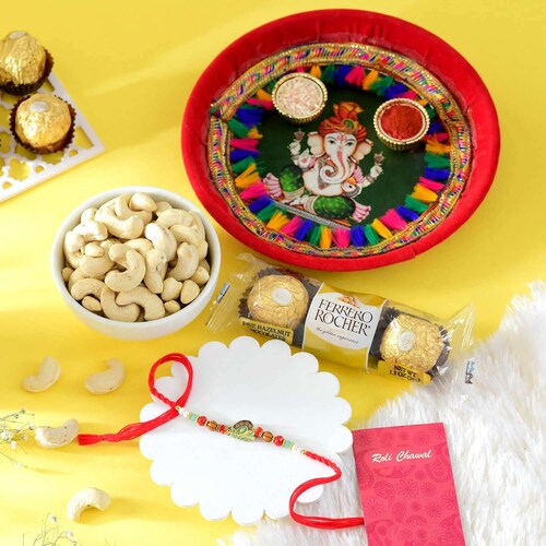 Buy Elegant Rakhi with Cashew Nuts and Lindt Extra Creamy Milk