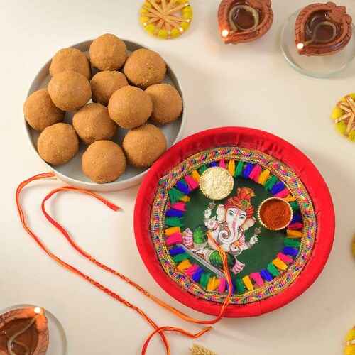 Buy 2 Rakhis with Pooja Thali and Sweets