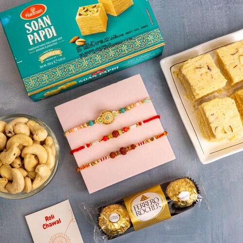 Buy Rakhis with Rochers Cashews and Soan Papdi