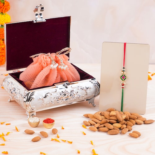 Buy Beautiful Kundan Pearl Rakhi with Almonds Potli