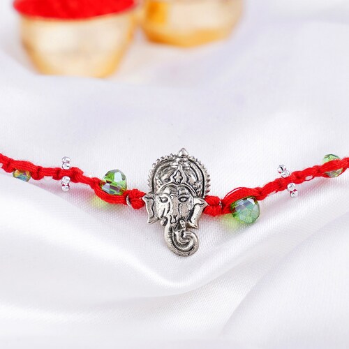 Buy Metallic Ganesha Rakhi