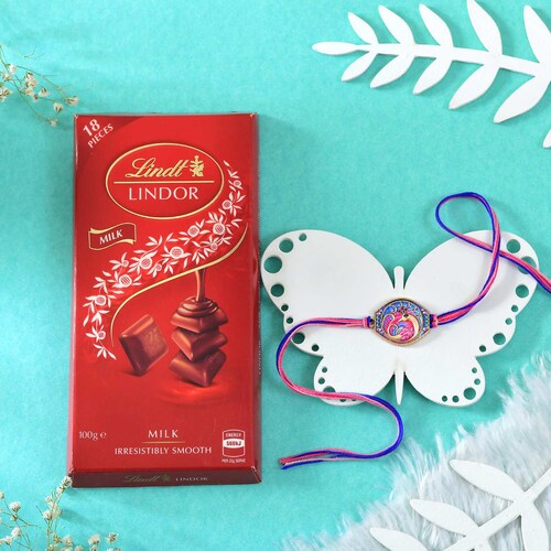 Buy Pious Mayura Rakhi with Lindt Lindor Chocolate