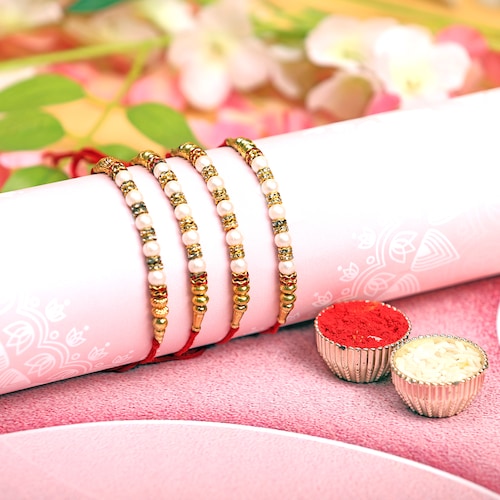 Buy Pearls of Joy Rakhi Collection