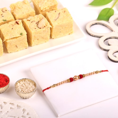 Buy Single Pearl Rakhi With Soan Papdi