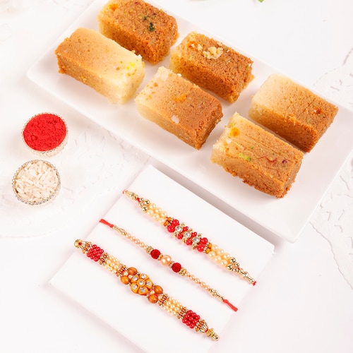 Buy Set Of Three Rakhis With Milk Cake Combo