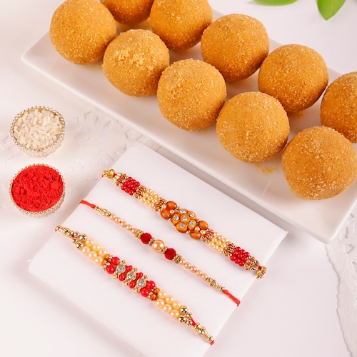 Buy Set Of Three Rakhis With Besan Laddoo