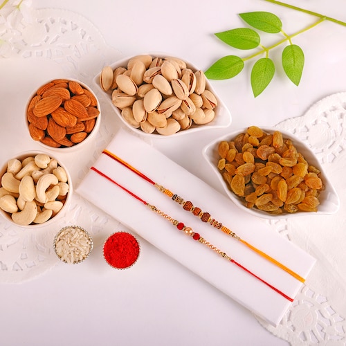 97748_Set Of 2 Rakhi With Dry Fruits Hamper