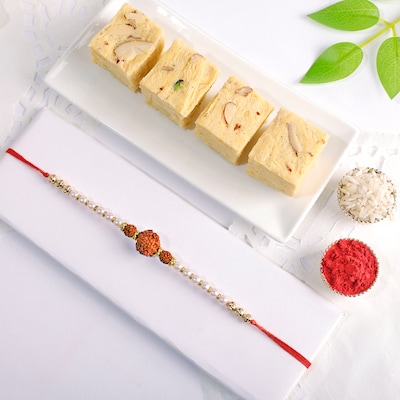 Pearl And Rudraksha Rakhi With Soan Papdi 250 gm