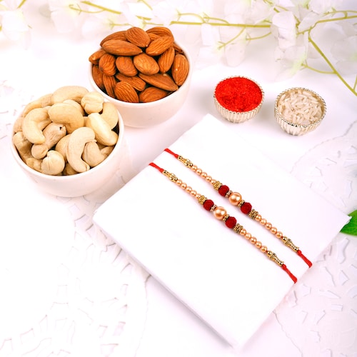 Buy Set Of 2 Pearl Rakhi With Dry Fruits Combo