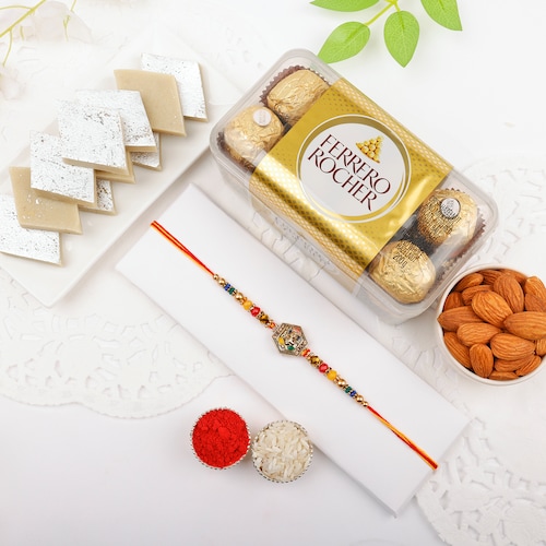 Buy Sacred Ganesha Rakhi with Delightful Treats