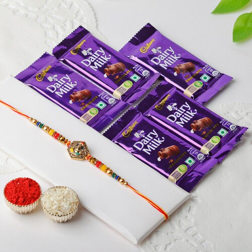 Buy Auspicious Ganesh Rakhi with Dairy Milk