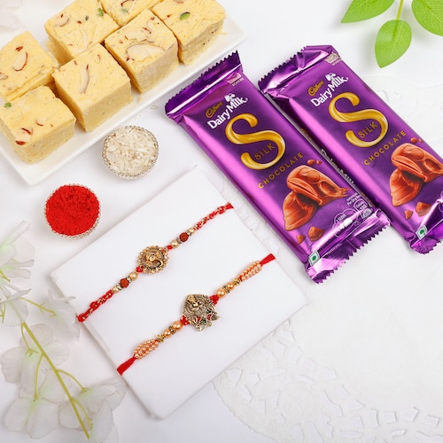 Buy Charming Rakhi Set with Soan Papdi and Chocolates