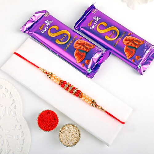 Buy 2 Layer Pearl Rakhi With Cadbury Silk Chocolate 60 gm