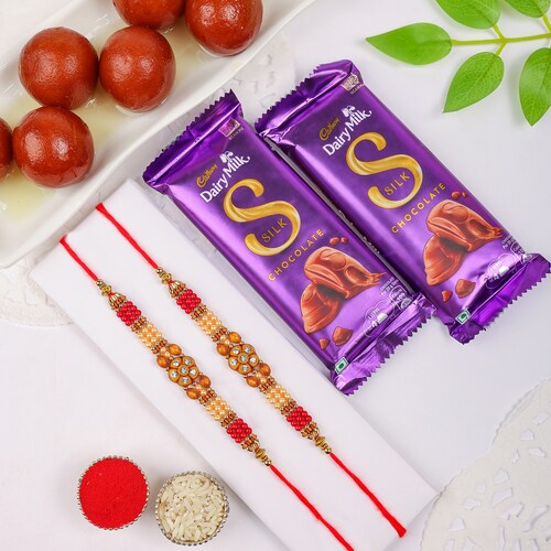 Buy Lovely Rakhi Set with Indulging Treats