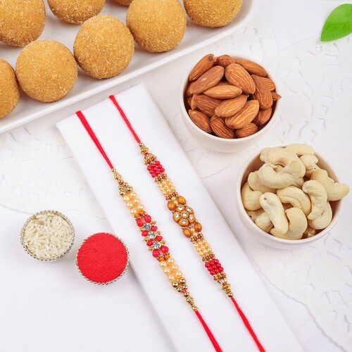 Buy Designer Rakhi Set and Nutty Sweets Combo