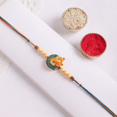 Buy Golden Ganpati Rakhi