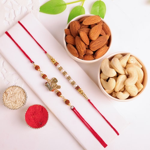 98274_Dazzling Rakhis With Dry Fruits