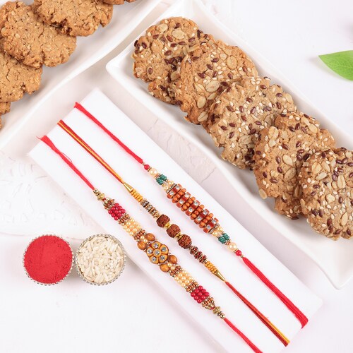 Buy Elegant Rakhi Set of 3 with Nutritious Cookies