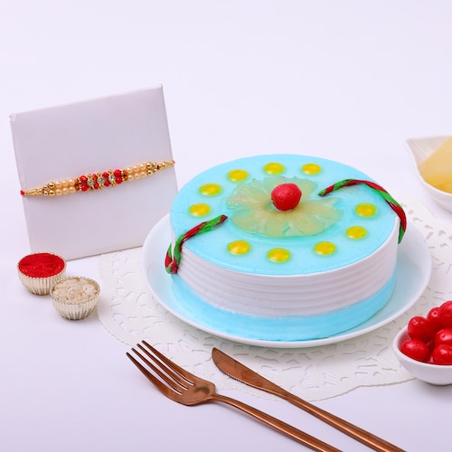 Buy Tempting Pineapple Cake with Stones Rakhi