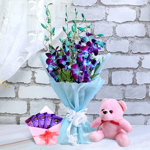 Buy Blue Orchids with Chocolates and Cuddly Teddy Bear