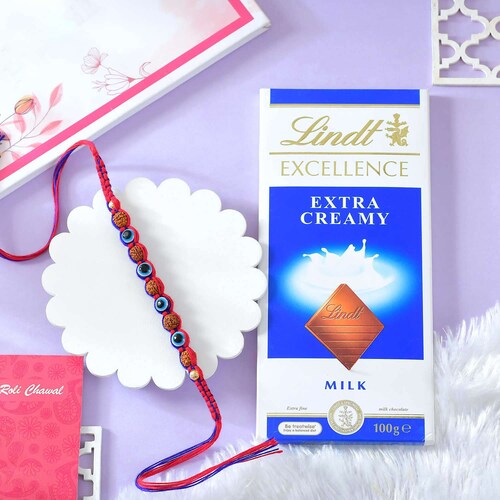 Buy Single Rakhi With Lindt Extra Creamy Chocolate